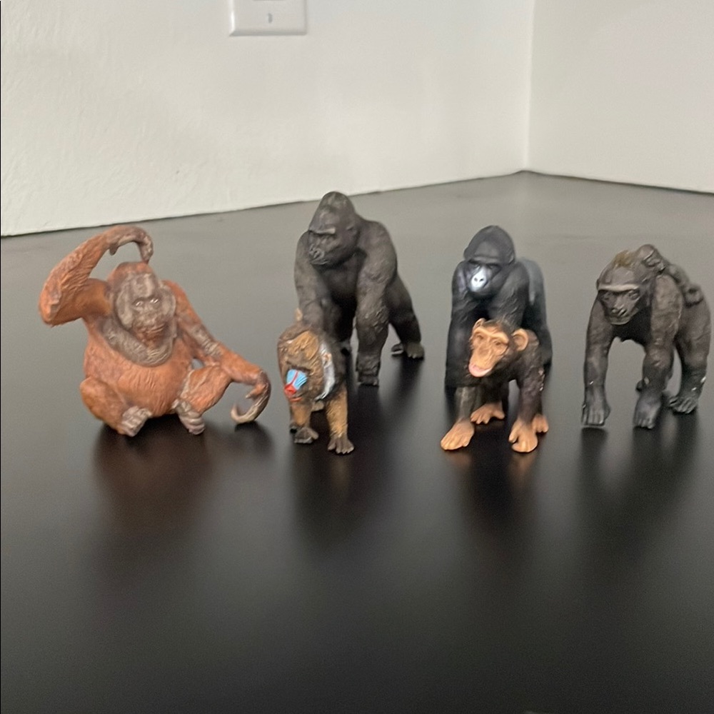 Brown and Black Primate Action Figures Set